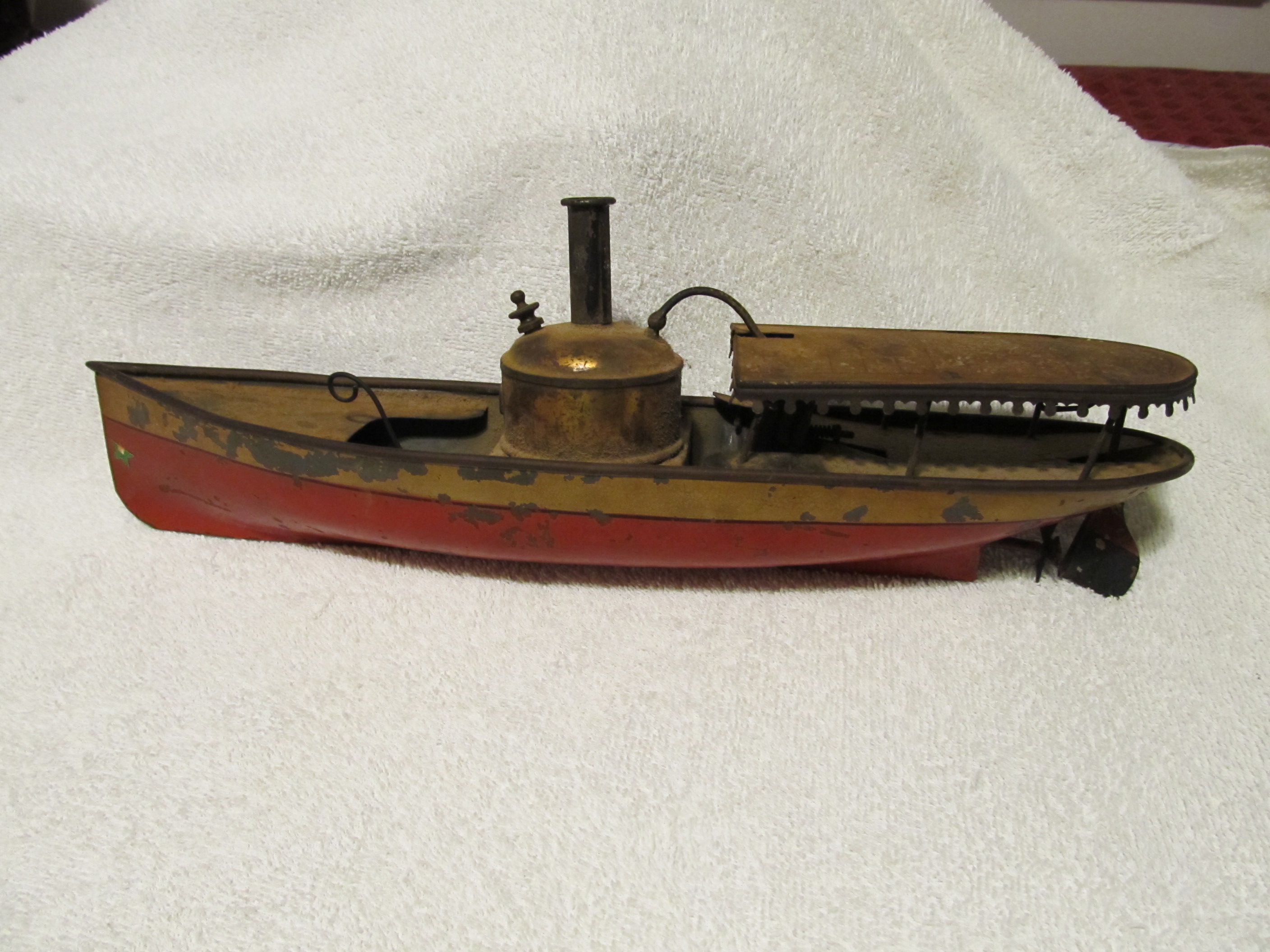 old steam powered tin boat InstAppraisal